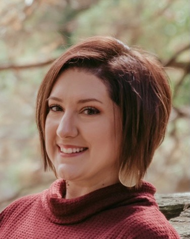 close-up headshot of author Courtney J. Hall