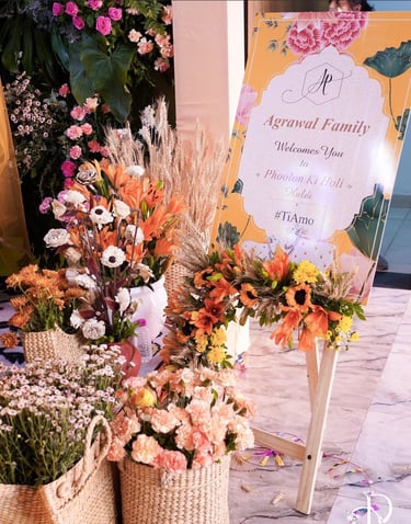 a display of flowers and plants in baskets
