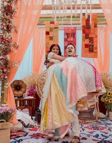 a bride and groom in a colorful wedding ceremony