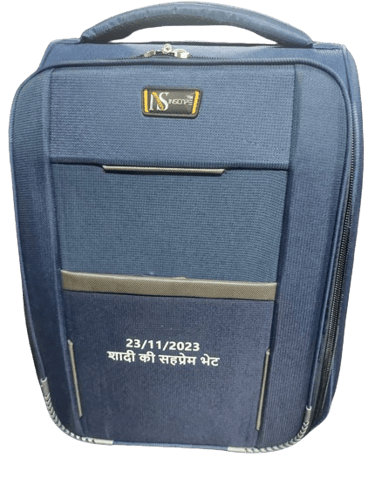 a blue suitcase with a quote on it