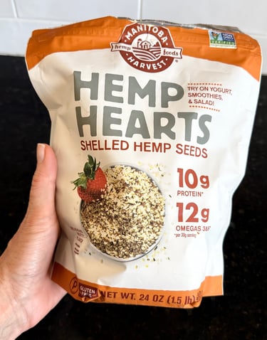 Bag of Manitoba Harvest hemp hearts showing protein and omega content on the front.