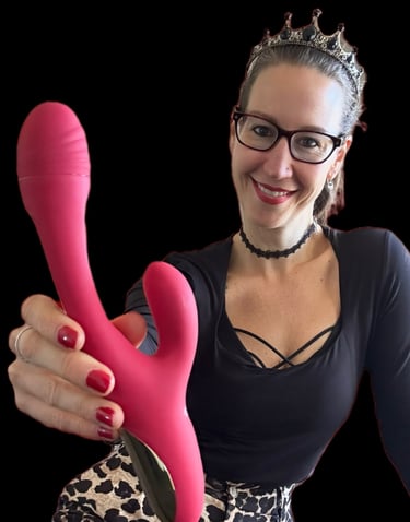 Pleasurelit Patricia holding the Sweet Smile Rabbit Vibrator for a review