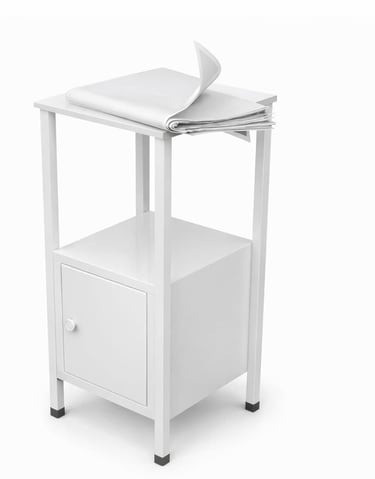 Minimalist white metal side table with a storage cabinet and a newspaper on top.