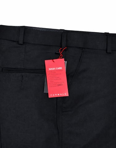 a black suit with a red tag tag on it