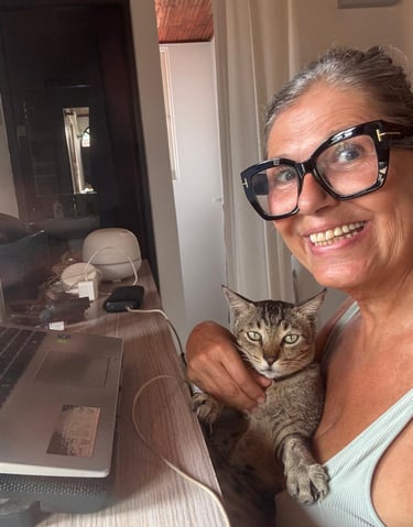 Happy cat cuddle moment at The Cat Residence Colombo — where every guest feels like family.