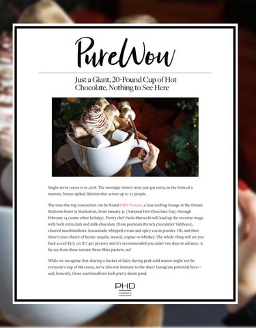 a person holding a cup of coffee and a cup of coffee