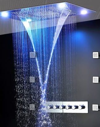 a shower head with a blue light shining down