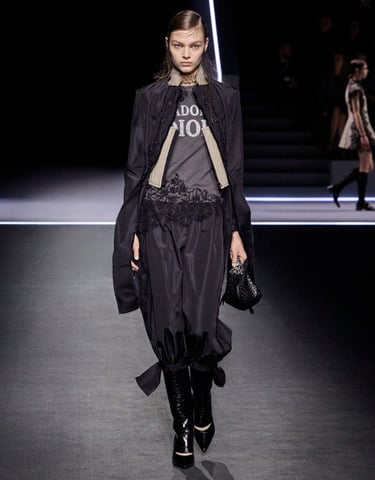 J’adore Dior tee with lace pants and coat.