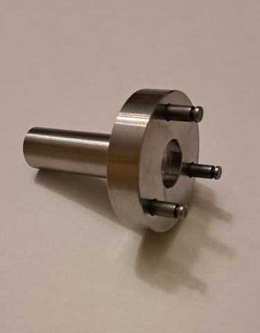 Precision-machined metal alignment pin tool with three guide pegs for construction or installation use