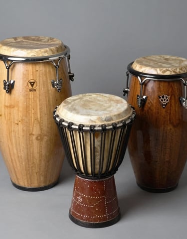 Selection of drum hardware like pedals, stands, and drum keys displayed neatly on a black background.