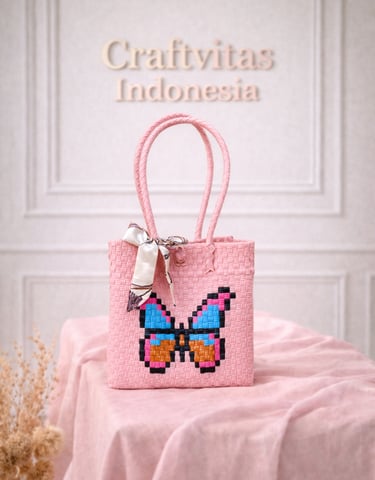 Pink handwoven plastic tote bag with butterfly character, handmade recycled plastic tote bag