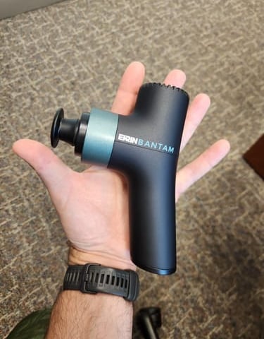 Compact and portable massage gun for quick muscle relief