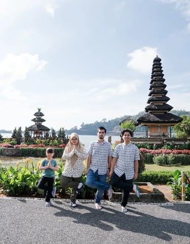 Iqbal family portrait with Ulun Danu Beratan Temple in the background at Bedugul Bali.