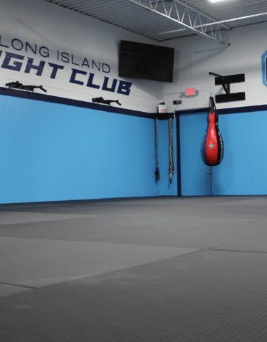 Long Island Fight Club gym interior with punching bags 