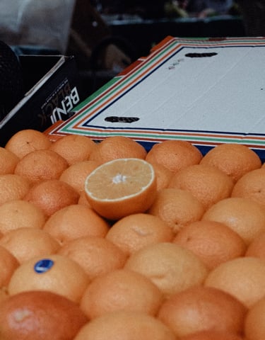 a bunch of oranges are sitting on a table