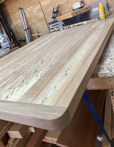 Spalted beach and walnut breadboard end dining table book matched