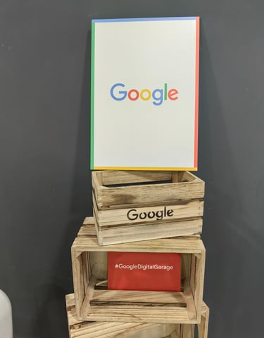A welcome sign with Google atop Google-branded crates