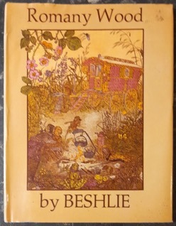 Vintage children's book cover of Romany Wood by Beshlie featuring a traditional gypsy caravan and campfire.