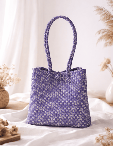 Handwoven purple striped plastic tote bag handmade from recycled materials by Indonesian artisans