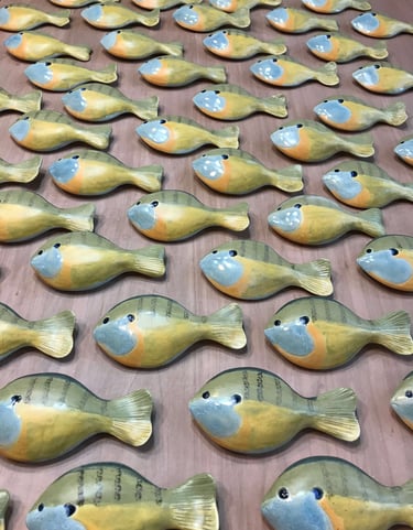 Ceramic blue gill sunfish on a table