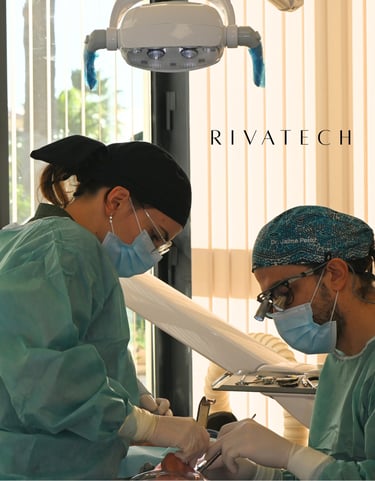 Professional dental surgeons performing a procedure using advanced medical technology at Rivatech clinic.