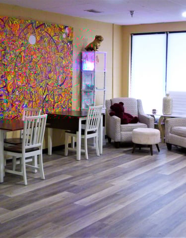 Seating at customer area just inside Classic Deli Cafe.