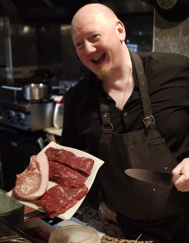 Chef et viande du restaurant le Bistrot