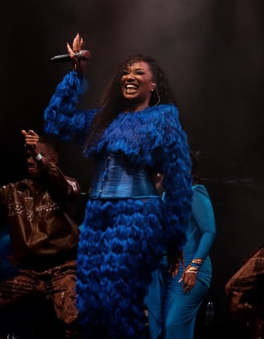 Fanny J singer it's a woman in a blue dress made to measure by Anais Ricard