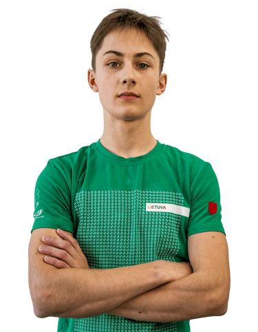 a boy in a green shirt 