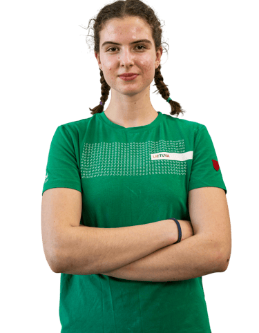 a girl in a green shirt 
