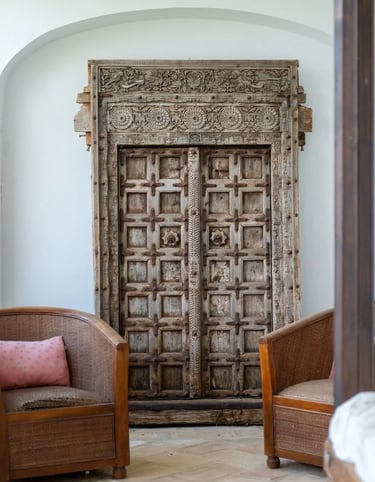 Antique carved wooden door at Finca Santa Katerina