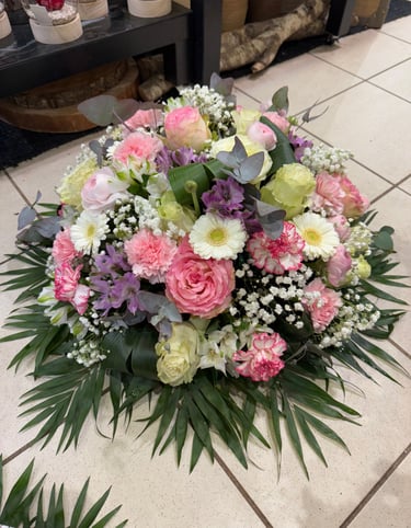 Deuil coussin rond par Artisan Fleuriste Ergué-Gabéric proche de Quimper