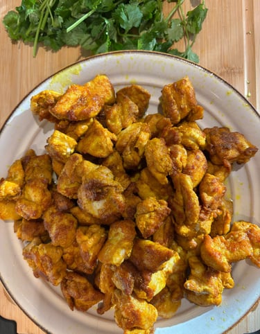 chopped and browned chicken thighs removed from pan