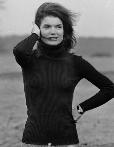 Jacqueline Kennedy wearing her signature Cartier Tank watch.