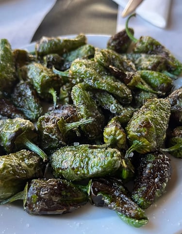 a plate of food with a fork and knife on it