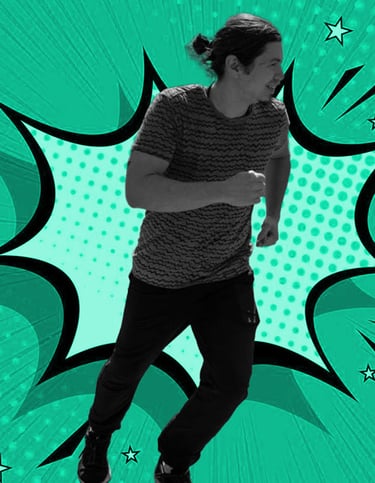 Teacher and founder Jeff running in front of a comic-style background