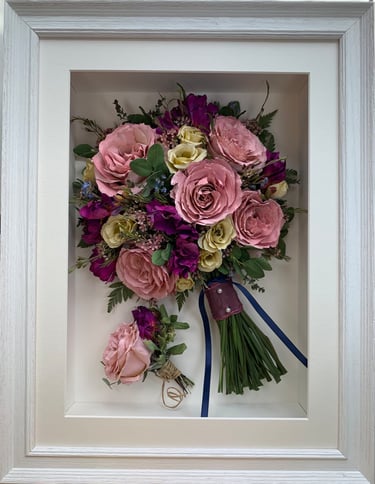 Side View preserved wedding bouquet in a ridged white frame