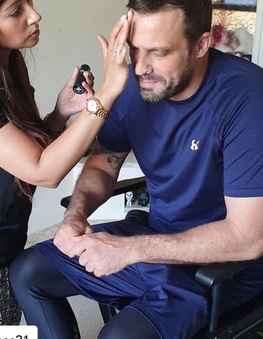 a male actor in a makeup chair is getting a makeover for a film