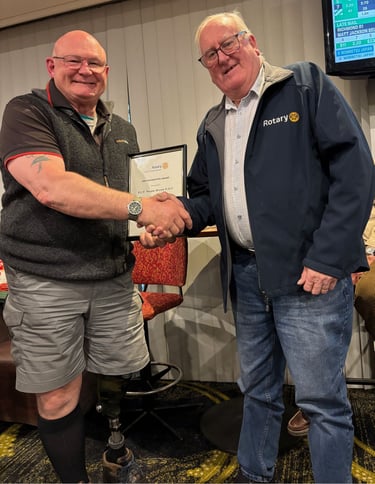 President Keith congratulates Wayne Brown for 25 years of service