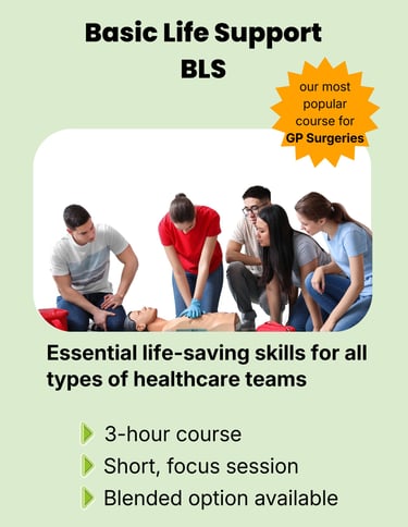 A group huddled together learning CPR on a Basic Life Support (BLS) course