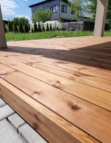 a wooden deck with a bench and a skateboard