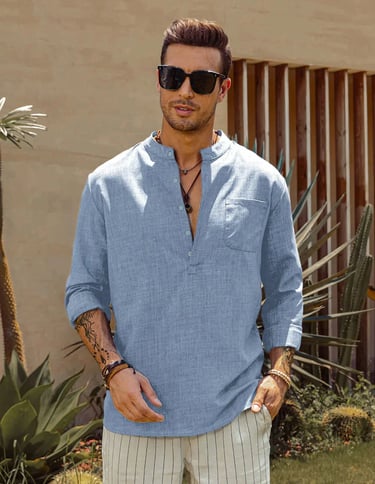 a sky blue shirt and white pants