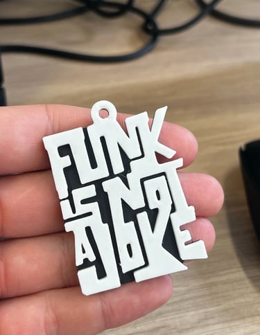 Porte-clés imprimé en 3D sur la base du logo du collectif de danse Funk is not a joke
