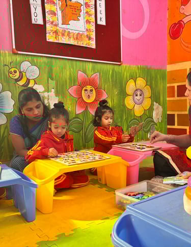 Preschool children solve colorful puzzles during an interactive early childhood education lesson with teachers.