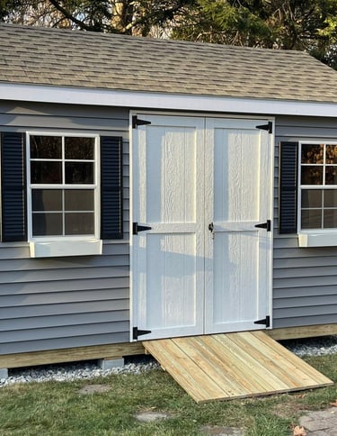 10x14 vinyl shed, handcrafted in North Andover, MA, offers a practical and stylish storage solution.
