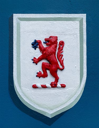 Vibrant lion rampant is surrounded by a crisp white trompe l'oeil shield