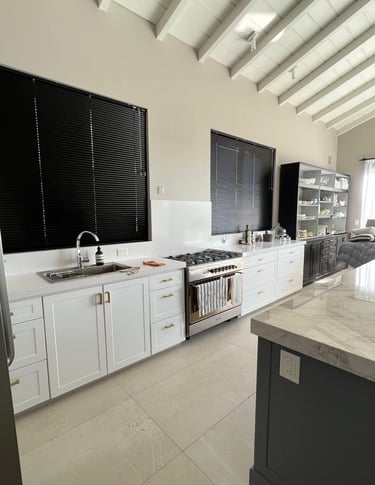 a kitchen with a stove top oven and a stove top oven