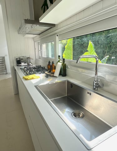 a kitchen with a sink and a window