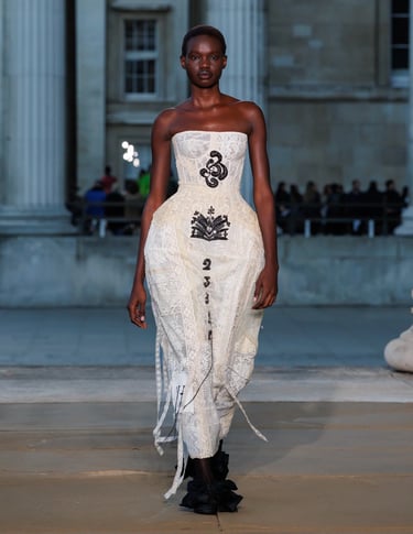 a woman in a white dress with from ERDEM spring summer 2026