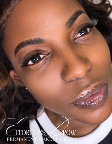A view of symmetrical and softly defined ombre powder brows immediately after the service.